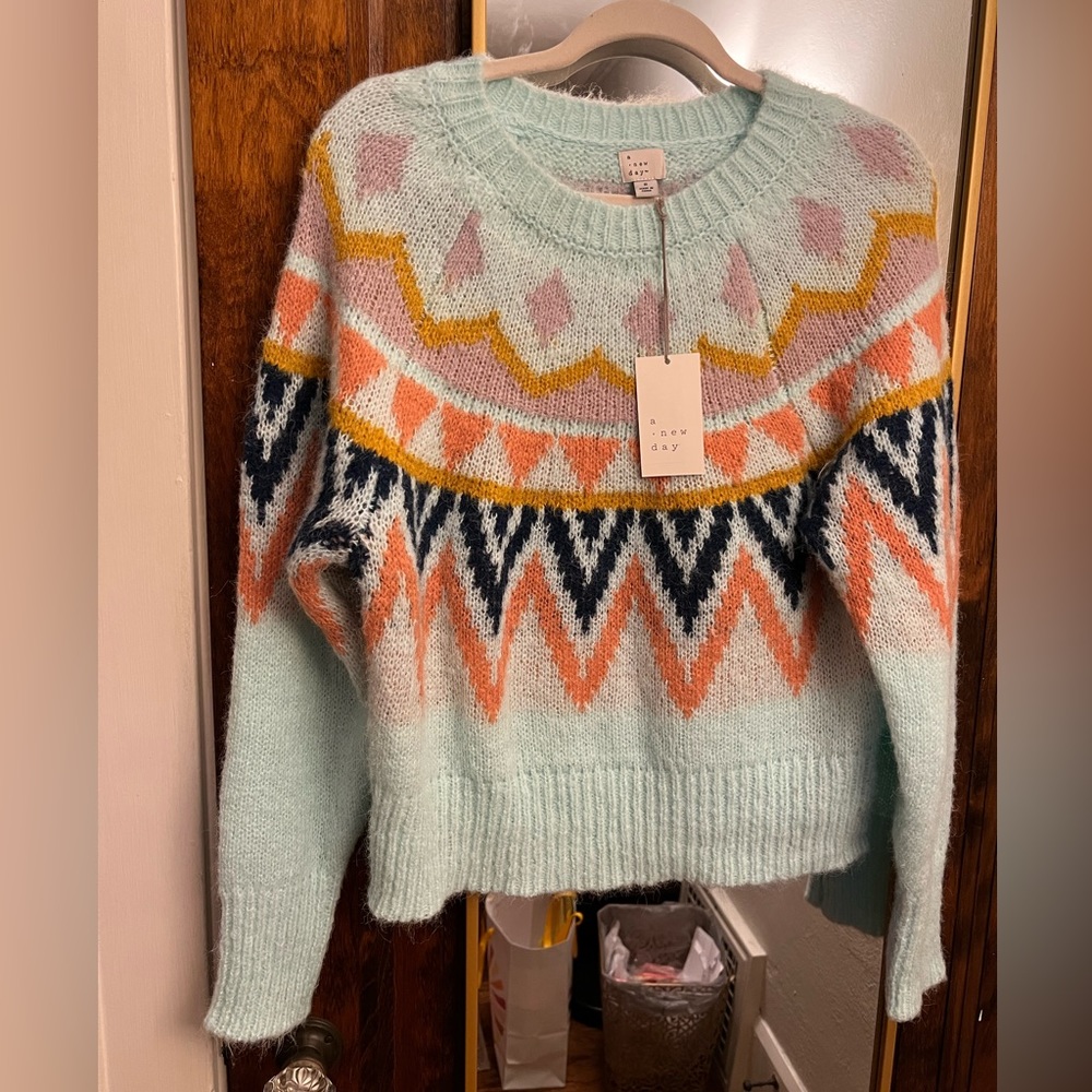 A New Day sweater